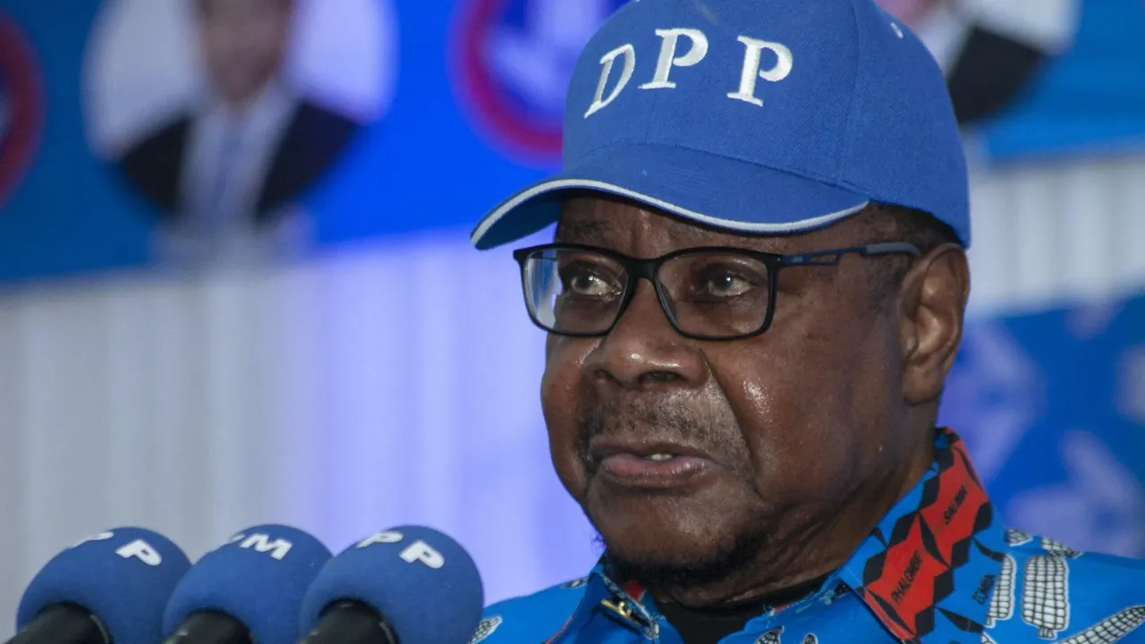 Peter Mutharika is seen in a blue cap at his party&#39;s convention in Blantyre on 18 Augut 2024