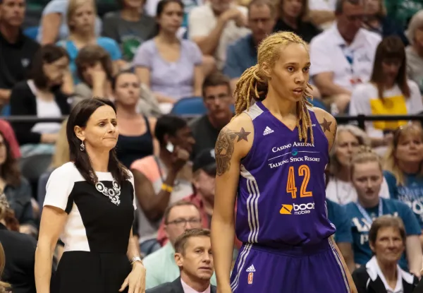Phoenix Mercury head coach Sandy Brondello and center Brittney Griner stand on the sideline during a WNBA on June 27, 2015.