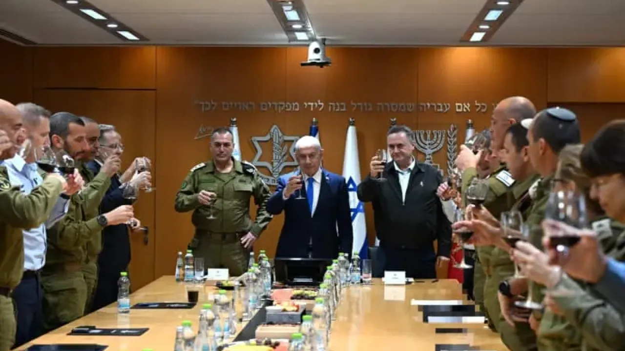 Prime Minister Benjamin Netanyahu toasts the Jewish New Year at the Kirya in Tel Aviv. September 22, 2025. (photo credit: HAIM ZACH/GPO)