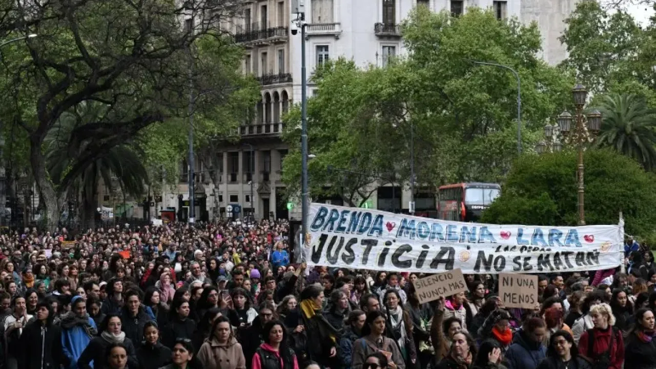 Relatives and friends attend a demonstration called by rights groups under the banner: