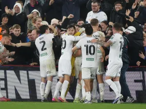 Swansea players celebrate during their victory over Nottingham Forest