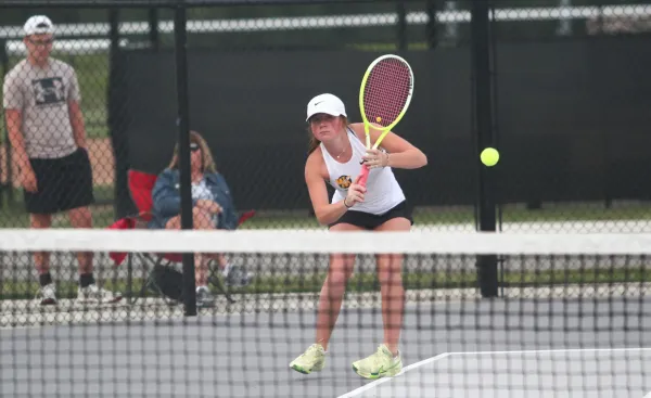 Watkins Memorial junior Nora Grennan watches her return during an Aug. 26 match against Zanesville's Bella Jarrett.
