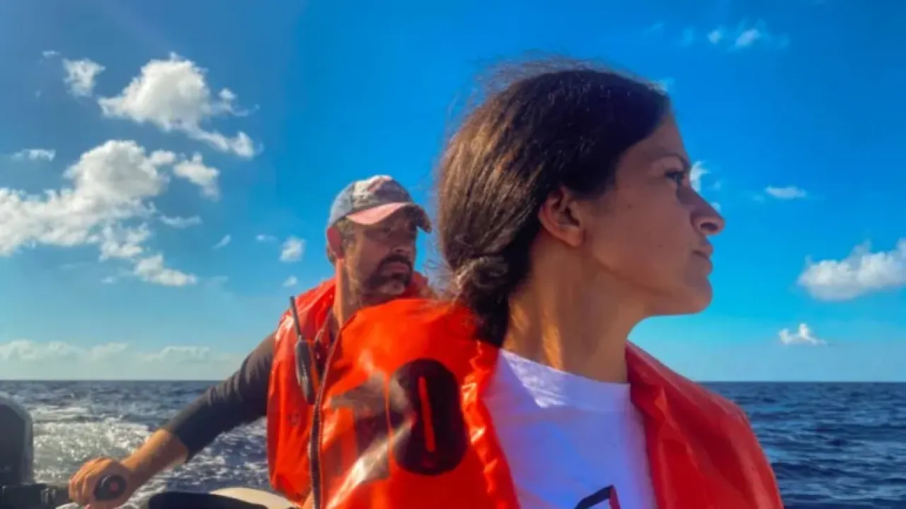 Woman and man on dinghy