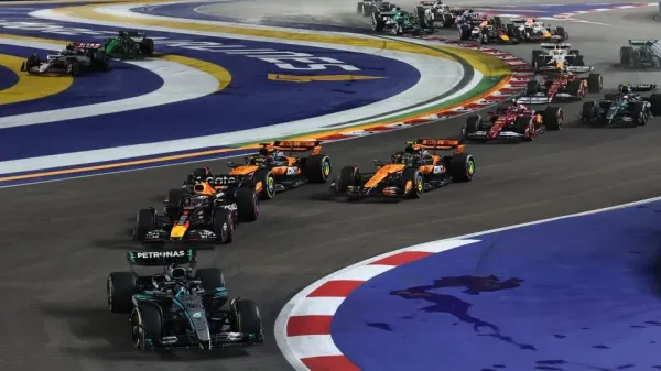 Mercedes' George Russell, Red Bull's Max Verstappen, McLaren's Oscar Piastri and McLaren's Lando Norris in action during the race. - Athit Perawongmetha/Reuters