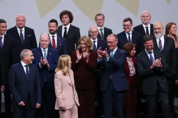 Italian Prime Minister Giorgia Meloni, German Chancellor Friedrich Merz, The North Atlantic Treaty Organization (NATO) Secretary General Mark Rutte, Spanish Prime Minister Pedro Sanchez and Albania's Prime Minister Edi Rama react as they and other leaders pose for a family photo at the 7th European Political Community (EPC) Summit at the Bella Center in Copenhagen. Suzanne Plunkett/PA Wire/dpa