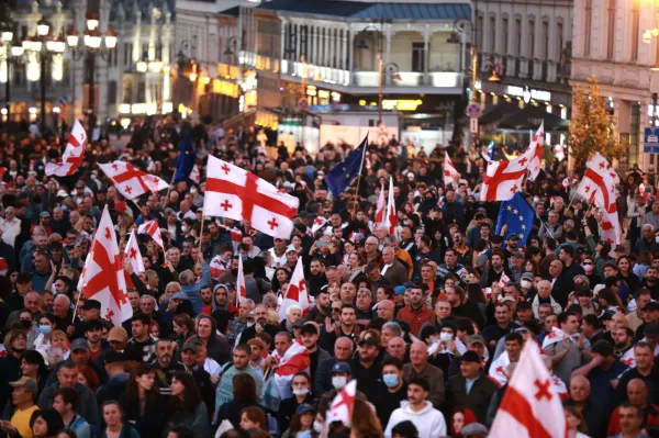 Opposition supporters with Georgian national and EU flags gather in the city center of Tbilisi, Georgia, on Saturday, Oct. 4, 2025, boycotting the municipal elections and call for the release of political opponents. (AP Photo/Zurab Tsertsvadze)(ASSOCIATED PRESS)