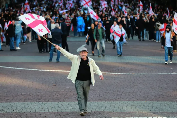 Opposition supporters with Georgian national flags gather in the city center of Tbilisi, Georgia, on Saturday, Oct. 4, 2025, boycotting the municipal elections and call for the release of political opponents. (AP Photo/Zurab Tsertsvadze)(ASSOCIATED PRESS)