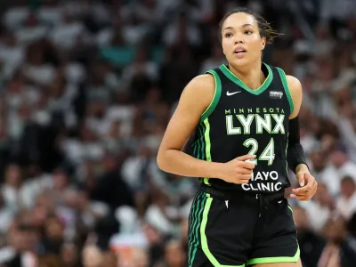 Oct 16, 2024; Minneapolis, Minnesota, USA; Minnesota Lynx forward Napheesa Collier (24) reacts to her basket against the New York Liberty during the first half of game three of the 2024 WNBA Finals at Target Center. Mandatory Credit: Matt Krohn-Imagn Images© Matt Krohn-Imagn Images