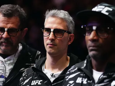 PARIS, FRANCE - SEPTEMBER 06: Coach Pablo Sucupira (center) is seen in the corner of Caio Borralho of Brazil during the UFC Fight Night event at The Accor Arena on September 06, 2025 in Paris, France. (Photo by Jeff Bottari/Zuffa LLC)