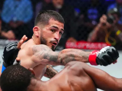 CHICAGO, IL - JUNE 27: Sergio Pettis throws a punch against Raufeon Stots during the semifinals of the PFL 2025 World Tournament at Wintrust Arena on June 27, 2025 in Chicago, Florida. (Photo by Cooper Neill/Getty Images)
