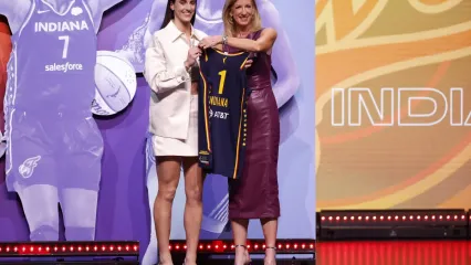 NEW YORK, NEW YORK - APRIL 15: Caitlin Clark poses with WNBA Commissioner Cathy Engelbert after being selected first overall pick by the Indiana Fever during the 2024 WNBA Draft at Brooklyn Academy of Music on April 15, 2024 in New York City. (Photo by Sarah Stier/Getty Images)Sarah Stier&sol;Getty Images