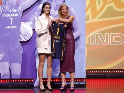 NEW YORK, NEW YORK - APRIL 15: Caitlin Clark poses with WNBA Commissioner Cathy Engelbert after being selected first overall pick by the Indiana Fever during the 2024 WNBA Draft at Brooklyn Academy of Music on April 15, 2024 in New York City. (Photo by Sarah Stier/Getty Images)Sarah Stier&sol;Getty Images