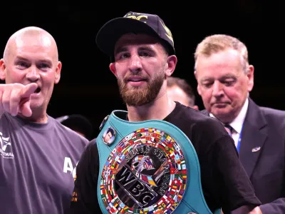 Nathaniel Collins (centre) celebrates following victory against Lee McGregor (not pictured) in the WBC Silver Featherweight bout at the OVO Hydro, Glasgow. Picture date: Saturday May 24, 2025. (Photo by Steve Welsh/PA Images via Getty Images)