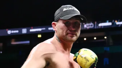 MANCHESTER, ENGLAND - AUGUST 30: Darren Till celebrates with his belt after victory in the Light Heavyweight fight between Darren Till and Luke Rockhold during the Misfits 22 - Ring of Thrones fight night at AO Arena on August 30, 2025 in Manchester, England.  (Photo by Ben Roberts Photo/Getty Images)
