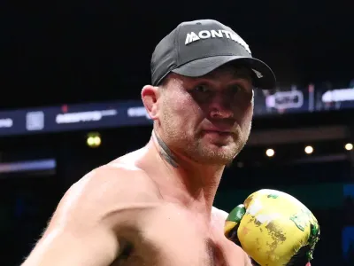 MANCHESTER, ENGLAND - AUGUST 30: Darren Till celebrates with his belt after victory in the Light Heavyweight fight between Darren Till and Luke Rockhold during the Misfits 22 - Ring of Thrones fight night at AO Arena on August 30, 2025 in Manchester, England.  (Photo by Ben Roberts Photo/Getty Images)