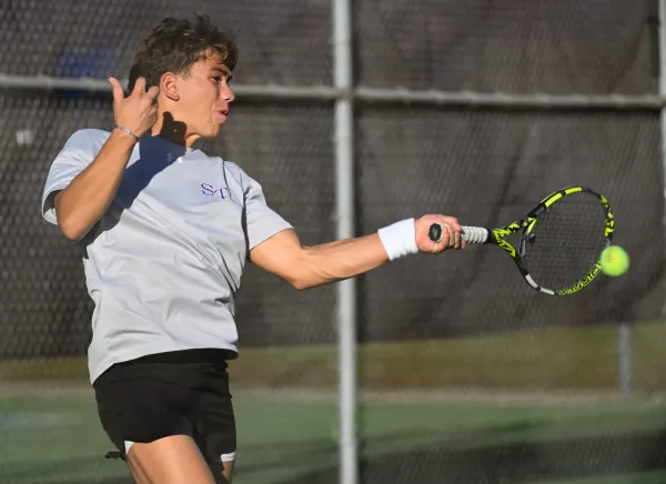 Bloomington South’s Marko Montano hits a forehand during his No. 2 doubles match against Bloomington North during the IHSAA boys’ tennis sectional first round at South on Tuesday, Sept. 30, 2025.