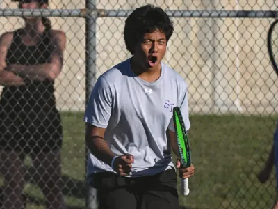 Bloomington South’s Joshua Sang celebrates after winning a point during his No. 1 doubles match against Bloomington North during the IHSAA boys’ tennis sectional first round at South on Tuesday, Sept. 30, 2025.