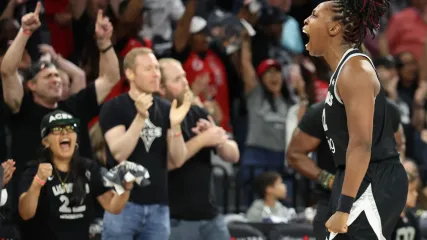 <span>Chelsea Gray of the Las Vegas Aces celebrates after defeating the Phoenix Mercury in Game 1 of the WNBA finals on Friday night.</span><span>Photograph: Ian Maule/Getty Images</span>
