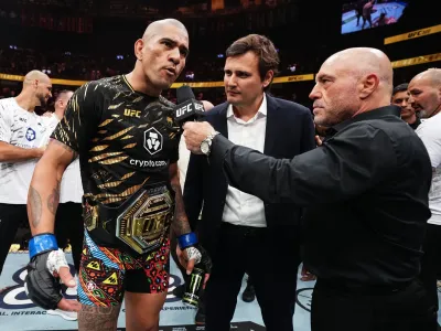 LAS VEGAS, NEVADA - OCTOBER 04: (R-L) Joe Rogan interviews Alex Pereira of Brazil in the UFC light heavyweight championship fight during the UFC 320 event at T-Mobile Arena on October 04, 2025 in Las Vegas, Nevada. (Photo by Jeff Bottari/Zuffa LLC)