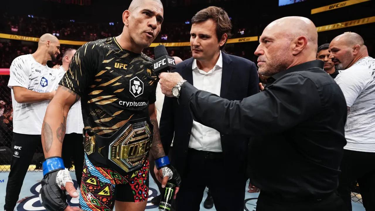 LAS VEGAS, NEVADA - OCTOBER 04: (R-L) Joe Rogan interviews Alex Pereira of Brazil in the UFC light heavyweight championship fight during the UFC 320 event at T-Mobile Arena on October 04, 2025 in Las Vegas, Nevada. (Photo by Jeff Bottari/Zuffa LLC)