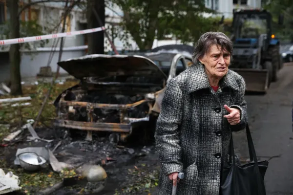 An elderly woman reacts next to the house destroyed by a Russian strike in Zaporizhzhia, Ukraine, Sunday, Oct. 5, 2025. (AP Photo/Kateryna Klochko)(ASSOCIATED PRESS)