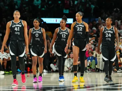 Sep 30, 2025; Las Vegas, Nevada, USA; Las Vegas Aces center Kiah Stokes (41), Las Vegas Aces guard Jackie Young (0), Las Vegas Aces guard Chelsea Gray (12), Las Vegas Aces center A&#39;ja Wilson (22), and Las Vegas Aces guard Jewell Loyd (24) take the court after an Indiana Fever time out in the fourth quarter of game five of the second round for the 2025 WNBA Playoffs at Michelob Ultra Arena. Mandatory Credit: Stephen R. Sylvanie-Imagn Images