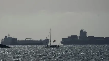 A vessels of the Sumud Flotilla enters Ashdod port escorted by the Israeli Navy. Prior to their arrival at the Gaza Strip, international activists boarding ships filled with humanitarian aid for Palestinians were detained by the Israeli Navy in international waters. Ilia Yefimovich/dpa