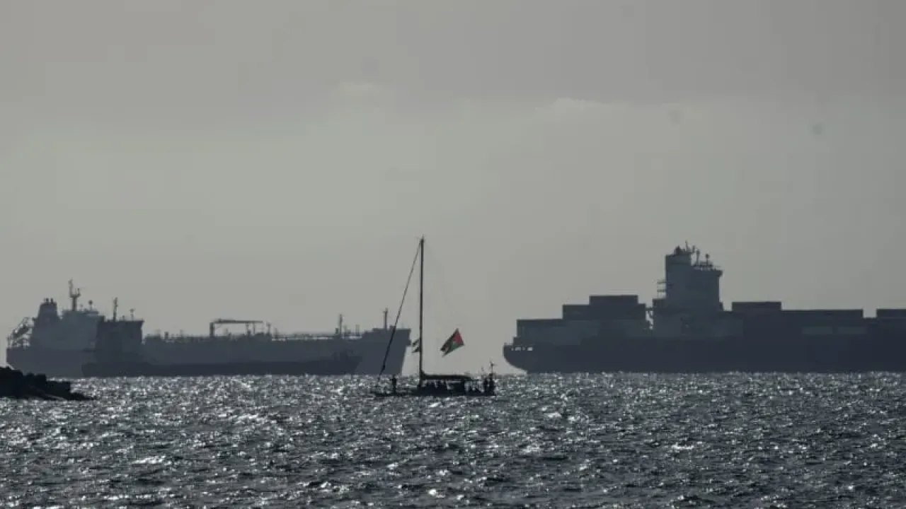 A vessels of the Sumud Flotilla enters Ashdod port escorted by the Israeli Navy. Prior to their arrival at the Gaza Strip, international activists boarding ships filled with humanitarian aid for Palestinians were detained by the Israeli Navy in international waters. Ilia Yefimovich/dpa