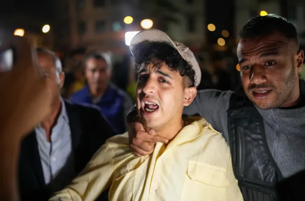 A boy is detained while taking part in a youth led protest calling for education and health reforms, in Casablanca, Morocco, Monday, Sept. 29, 2025. (AP Photo/Mosa'ab Elshamy)(ASSOCIATED PRESS)
