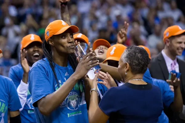 Oct 4, 2017; Minneapolis, MN, USA; Minnesota Lynx center Sylvia Fowles (34) kisses the MVP trophy after the game against the Los Angeles Sparks in Game 5 of the WNBA Finals at Williams Arena. Mandatory Credit: Brad Rempel-USA TODAY Sports