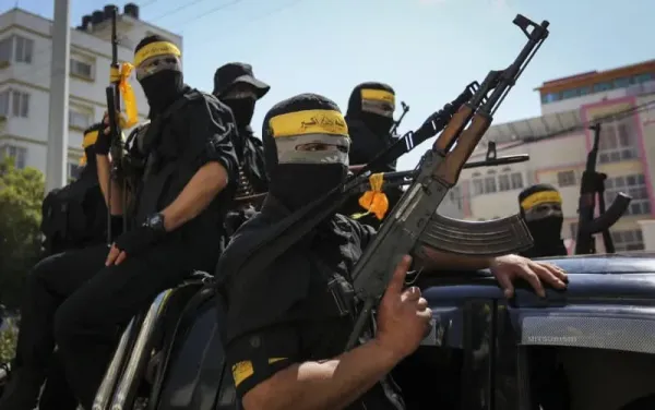 Hamas members from the Qassam brigade, the military wing of Hamas, attend the funeral of Mazen Faqha in Gaza City, Saturday, March, 25, 2017. (photo credit: Ramadan Abed/Reuters)