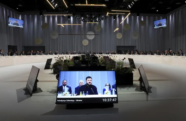 Ukrainian President Volodymyr Zelenskyy is seen on a giant screen as he speaks during the European Political Community summit, in Copenhagen, Thursday, Oct. 2, 2025. (Suzanne Plunkett/Pool Photo via AP)(ASSOCIATED PRESS)