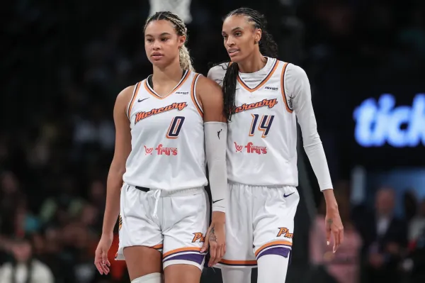 Sep 17, 2025; Brooklyn, New York, USA; Phoenix Mercury forward DeWanna Bonner (14) talks with forward Satou Sabally (0) during game two of round one for the 2025 WNBA Playoffs against the New York Liberty at Barclays Center. Mandatory Credit: Wendell Cruz-Imagn Images