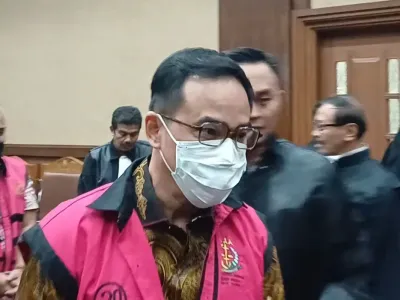 Mantan Kepala Dinas Kebuadayaan (Kadisbud) Daerah Khusus (DK) Jakarta, Iwan Henry Wardhana usai didakwa merugikan keuangan negara Rp 36.319.045.056,69 (Rp 36,3 miliar) di Pengadilan Tipikor Jakarta Pusat, Selasa (17/6/2025) malam.