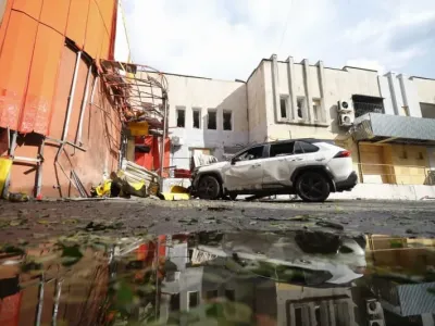 A view of a car outside a building of the Novaya Kakhovka Municipal Council damaged in a drone attack by the Armed Forces of Ukraine. Alexei Konovalov/TASS via ZUMA Press/dpa