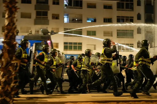 Security forces disperse a gathering as youth led protests calling for healthcare and education reforms turned violent, in Sale, Morocco, Wednesday, Oct. 1, 2025. (AP Photo/Mosa'ab Elshamy)(ASSOCIATED PRESS)