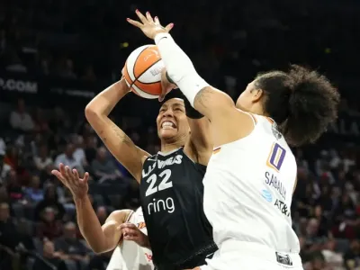 A'ja Wilson of the Las Vegas Aces shoots over Satou Sabally in the Aces' victory over the Phoenix Mercury in game two of the WNBA Finals (Ian Maule)