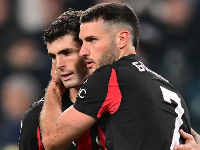 AC Milan&#39;s Santiago Gimenez consoles team-mate Christian Pulisic