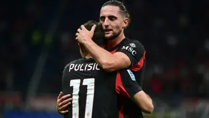 Adrien Rabiot celebrates Christian Pulisic's goal for AC Milan against Napoli (Piero CRUCIATTI)