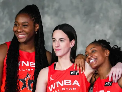 Aliyah Boston (7), Caitlin Clark (22) and Kelsey Mitchell (0) make up the Indiana Fever's Big 3.