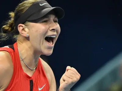 Amanda Anisimova celebrates during her China Open final win against Linda Noskova