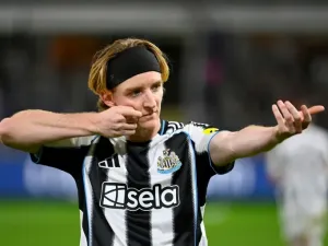 Anthony Gordon scored twice from the spot as Newcastle won in Belgium (JOHN THYS)