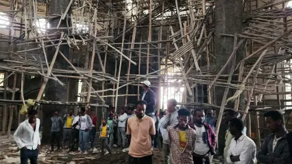 AP Photo/Samuel Getachew Worshippers inside the church where the scaffolding collapsed in Ethiopia