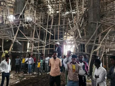 AP Photo/Samuel Getachew Worshippers inside the church where the scaffolding collapsed in Ethiopia