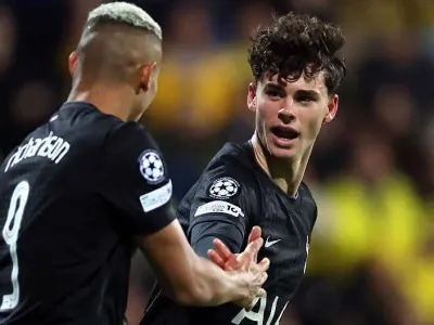 Archie Gray and Richarlison celebrate a goal for Tottenham