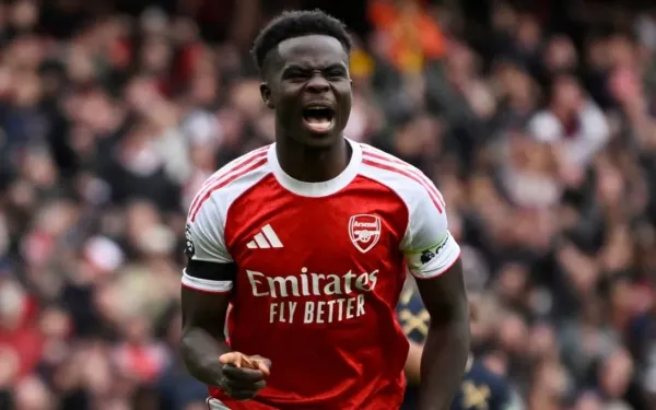 Arsenal's Bukayo Saka celebrates scoring their second goal