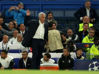 Benfica boss Jose Mourinho acknowledges chants from Chelsea fans (Adrian Dennis)