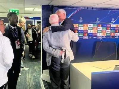 Benfica manager Jose Mourinho hugs former long-serving Chelsea employee Brian Pullman at Stamford Bridge