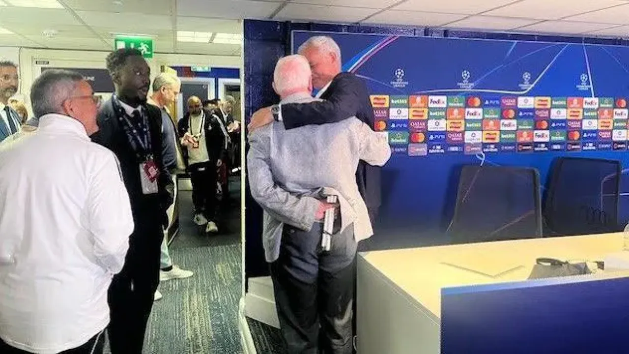Benfica manager Jose Mourinho hugs former long-serving Chelsea employee Brian Pullman at Stamford Bridge