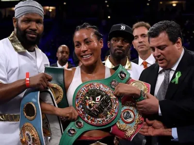 Cecilia Braekhus poses with belts